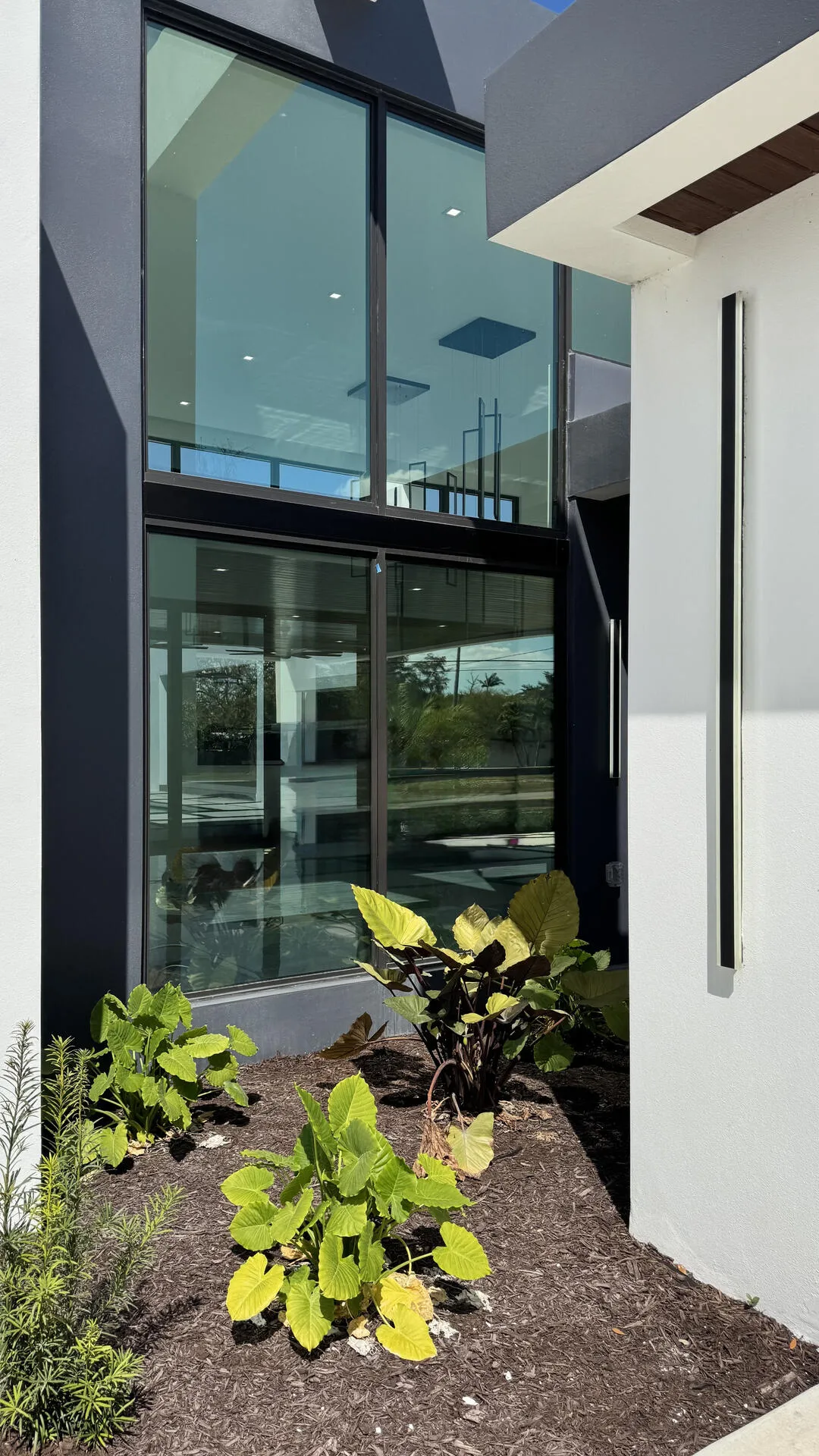 Front of home with residential window tint