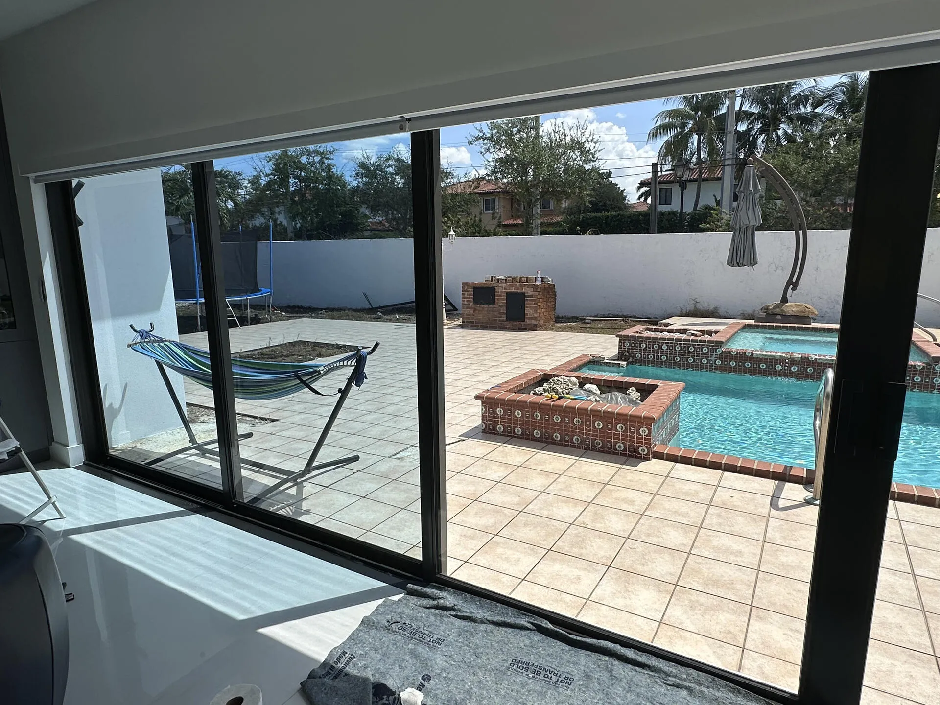 Bright room with glare-reducing window film